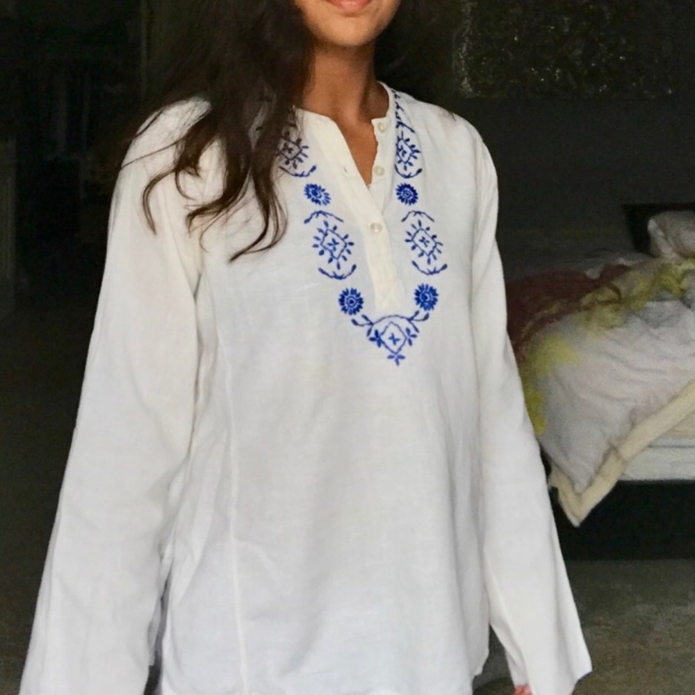 beautiful white top with blue embroidery